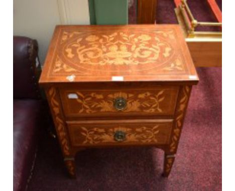 A DUTCH STYLE MARQUETRY PETITE COMMODE, O.R.M,  profusely inlaid with flowers, the rectangular top above two drawers on squar