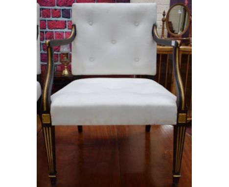 A SET OF THREE GRAINED AND PARCEL GILT OPEN ARMCHAIRS, each with button back and seat, covered in ivory fabric, and raised on