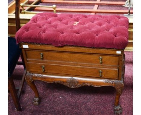 A RECTANGULAR MAHOGANY STOOL, the padded top with button upholstery, above two drawers, raised on four leaf carved cabriole l