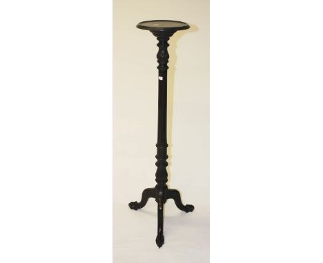 A MAHOGANY TORCHERE, with circular dish top, on a carved and fluted stem and tripod base, 48” (122cm) high. (1)