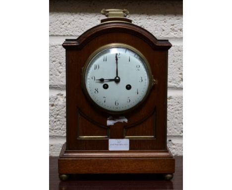 A SMALL REGENCY STYLE BRASS MOUNTED BRACKET CLOCK, the French movement by A.D. Mougin, striking on a steel gong, the convex e
