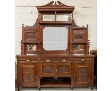 A LARGE EDWARDIAN WALNUT CHIFFONIER OR SIDEBOARD, with swan neck pediment and urn finial above a moulded cornice, and a shelf