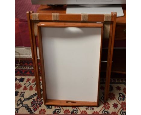 A MODERN BUTLERS TRAY, on folding stand, together with a modern rectangular footstool and another small circular stool. (3) 