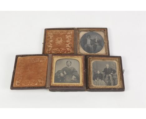 VICTORIAN AMBROTYPE PORTRAIT PHOTOGRAPH OF A SEATED LADY AND GENTLEMAN, he in top hat and bow tie, she in a bonnet in  FLORAL