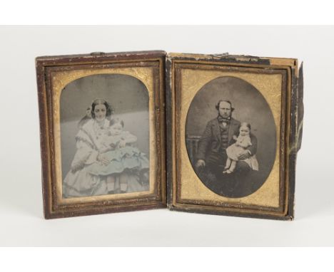 NINETEENTH CENTURY TINTYPE PORTRAIT PHOTOGRAPH, of a gentleman seated with a baby girl on his knee, in fabric clad frame, the