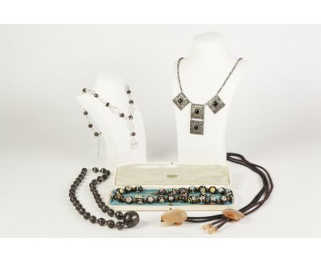 SINGLE STRAND NECKLACE OF BLACK AND FLORAL MILLEFIORI GLASS UNIFORM ROUND BEADS and the pair of matching EARRINGS, in case; c