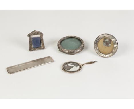 THREE VERY SMALL SILVER EASEL PHOTOGRAPH FRAMES, one having pointed arch, the other two circular,  MINIATURE SILVER BACKED HA