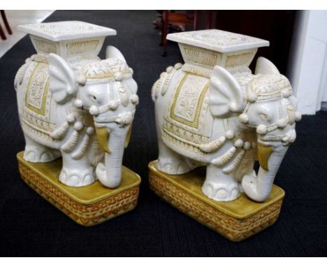 Pair elephant form ceramic stools/stands good pair, each in the form of a standing elephant, on stepped bases, (height 58cm a