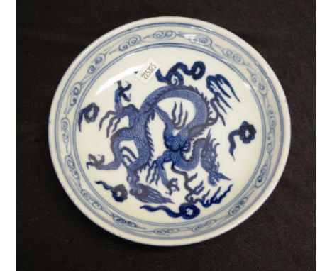Chinese blue and white shallow bowl with dragon approx 18cm diameter, red seal on base