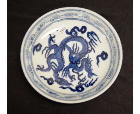 Chinese blue and white shallow bowl with dragon approx 18cm diameter, red seal on base