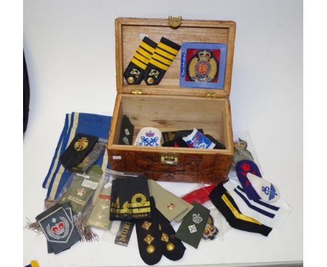 Quantity of military uniform epaulettes badges & other, including RAN, RAAMC, Royal Engineers, etc, together with a sash, con