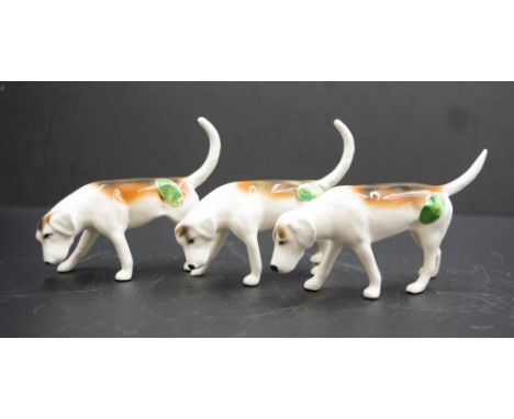 Set three Beswick hunting dog figures each marked to base, (height 8cm approx, each).