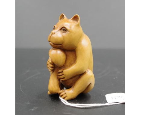 Japanese carved wood forest mammal netsuke signature to base, 7cm height approx