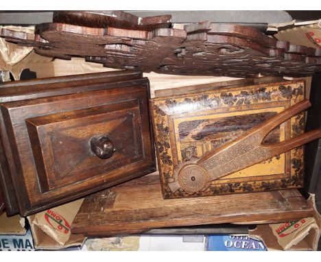 A box containing various items of treen; an unusual oak trinket box, Tunbridgeware sewing box, book slide, nutcracker and a f