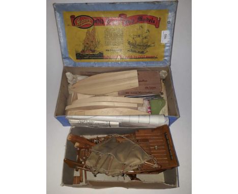 A boxed vintage 1960's Hobbies Old Time Ship Models "Mayflower", kit no. 2147 and a small wooden boat.  