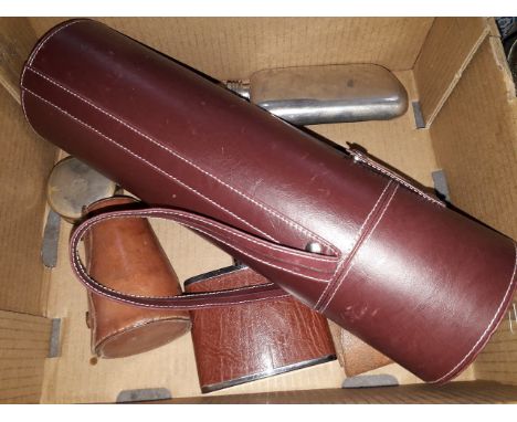 A box containing hunting travel beakers in leather case, spirit flask, leather bottle holder etc.  