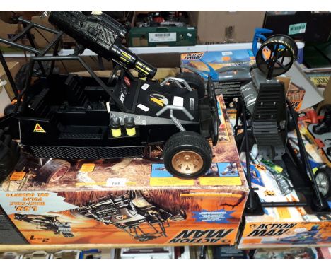 Box of Action man figures (14 in total), Action Car, other boxed vehicles and various accessories.  