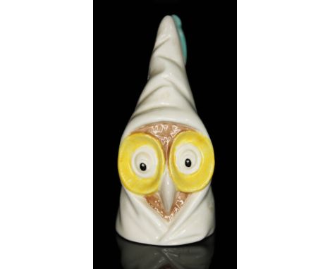 A Royal Worcester porcelain candle snuffer modelled as an owl.  