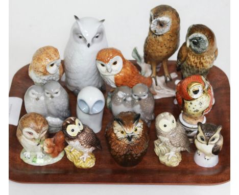 Fourteen assorted owl ornaments comprising Royal Copenhagen, Beswick, Royal Worcester, Goebel, Royal Dux and Royal Crown Derb