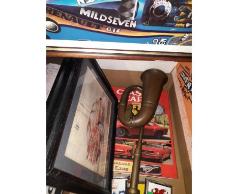 A box containing 3 vintage car badges, brass motor horn, 2 Ford limited edition prints, Jensen Button limited edition print a