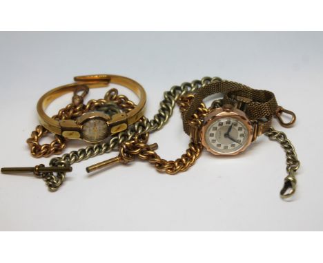 A ladies hallmarked 9ct gold Stylex wristwatch, together with a gold plated bangle watch and two watch chains.  