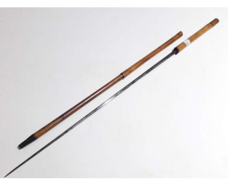 A stick sword, late 19th century/early 20th century, length of blade 67.5cm.  The stick is bamboo and presents signs, cracks 