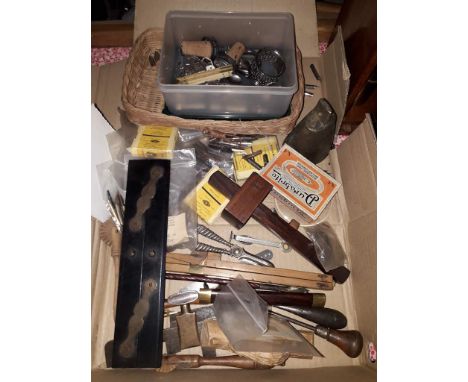 A box containing various vintage tools and rulers, pen nibs, silver plated items etc.  