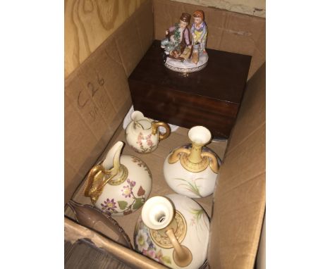 A box containing various items of Royal Worcester icluding a pair of blush ivory vases and two jugs, a Dresden figurine and a