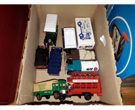 A box of die-cast toy vehicles; 3 Oxford, 6 Corgi.  