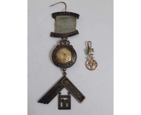 A hallmarked silver Masonic medal Liverpool Dramatic Lodge 1609 with ribbon and clip dated 1950, together with a yellow metal