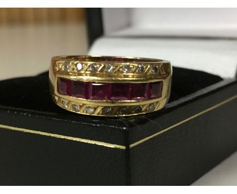 18CT GOLD LADIES DIAMOND AND RUBY CHANNEL SET RING . 6 CHANNEL SET RUBIES BETWEEN 2 ROWS OF 7 DIAMONDS. SIZE L APPROX 6.7G