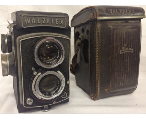 A VINTAGE WALZFLEX COPAL MXV CAMERA NO.37082 IN ORIGINAL LEATHER CASE.