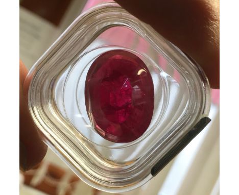 A CERTIFIED LARGE OVAL RUBY, 38.095 CT. SIZE 24.51 X 18.30 X 8.09 MM