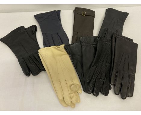 A collection of vintage leather and synthetic ladies gloves.  