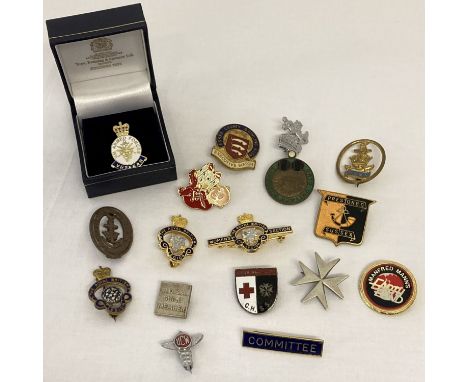 A collection of vintage and modern enamelled pin badges.  To include bowling clubs, British Legion and a boxed H.M.Armed forc