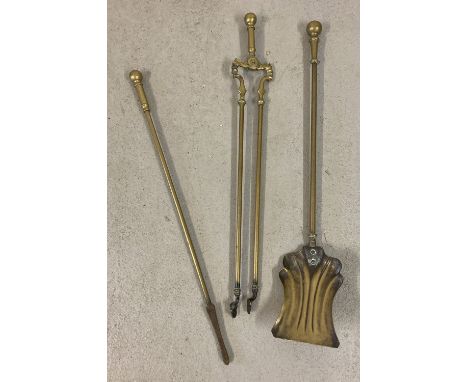3 vintage brass fireside tools. A poker, an Art Nouveau style shovel and a pair of tongs.  