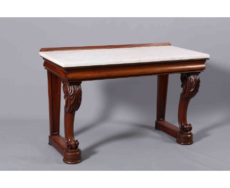 A WILLIAM IV MAHOGANY AND MARBLE TOPPED CONSOLE TABLE, with moulded backboard and long shaped front frieze drawer, raised on 