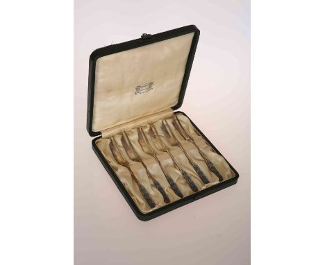 A SET OF SIX SILVER AND ENAMEL CAKE FORKS, Liberty & Co, Birmingham 1926, in original box.