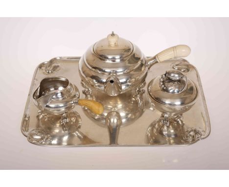 A SILVER "BLOSSOM" TEA SERVICE BY GEORG JENSEN, comprising rectangular tray, teapot, milk jug and sugar bowl and cover with b