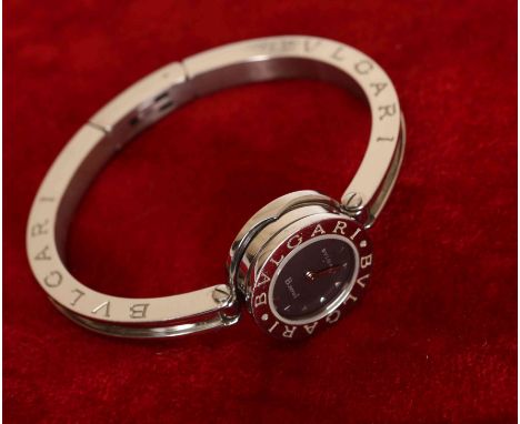 BULGARI, A LADY'S STAINLESS STEEL BANGLE WRISTWATCH, model B. Zero 1, quartz movement, black circular dial, signed twice to t