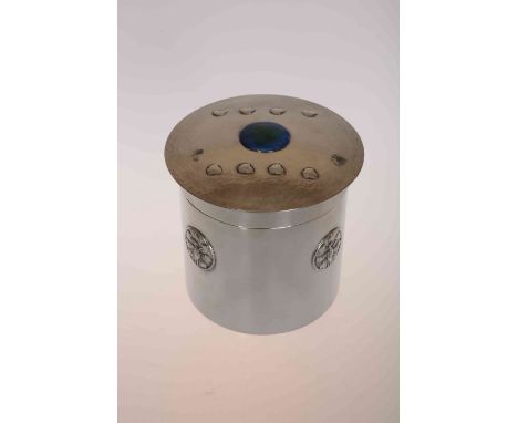 LIBERTY & CO, A TUDRIC PEWTER AND ENAMEL CADDY, the circular slightly domed cover centred by a blue and green enamel roundel 