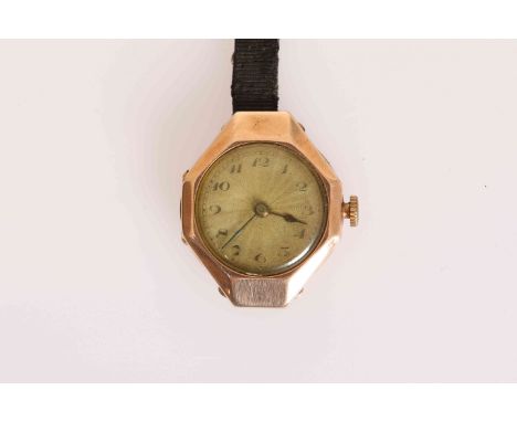 A VINTAGE 9 CARAT GOLD ROLEX WRISTWATCH, the case hallmarked W&D, 1920, the circular sunburst dial with Arabic numerals withi