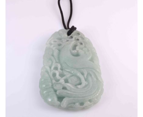 A LARGE CHINESE JADE PENDANT PLAQUE, carved with a ho-ho bird, further carved verso, strung. 12.5cm by 6.5cm