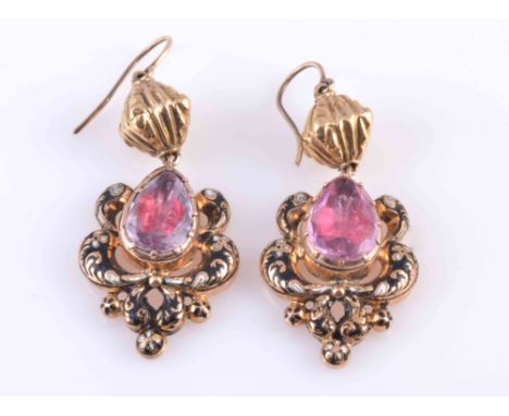 A PAIR OF FOIL BACKED TOPAZ AND ENAMEL EARRINGS, CIRCA 1830-1840, the pear mixed cut foil backed topaz each claw and collet s
