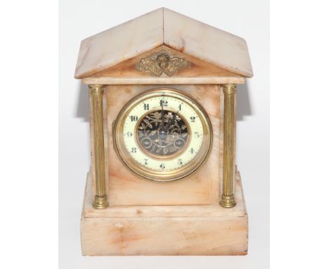 Victorian striking mantel clock in cream decorative onyx case 