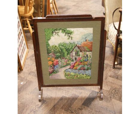 Tapestry panelled oak framed fire screen