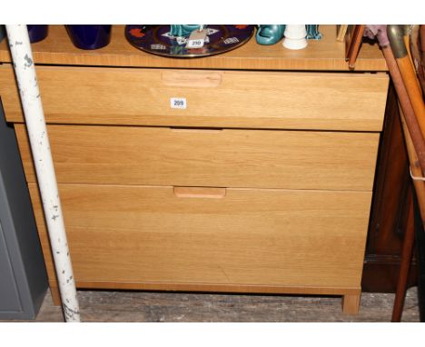 2' 6" light oak finish chest of 3 long drawers