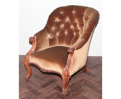 Victorian walnut framed gold upholstered button back elbow chair on cabriole legs 