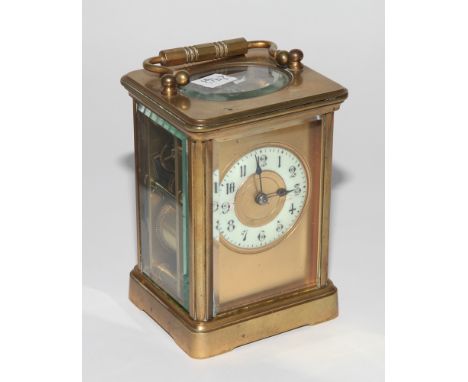 French brass cased carriage clock with striking movement   Condition - There is damage to the enamel on the dial at the 3 and