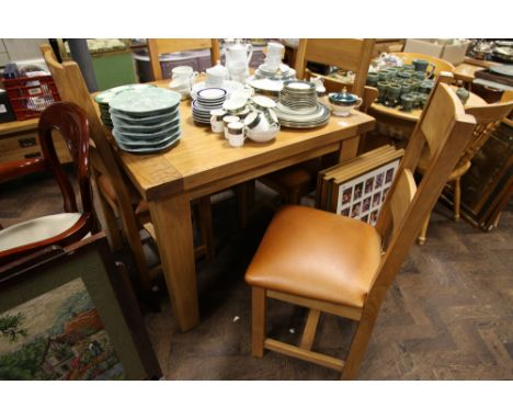 3' 3" square heavy light oak dining table together with 4 matching chairs with tan leather seats